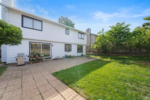 624 N Regatta Dr, Vallejo, CA 94591 - back of house featuring a patio area, a lawn, and a fenced backyard