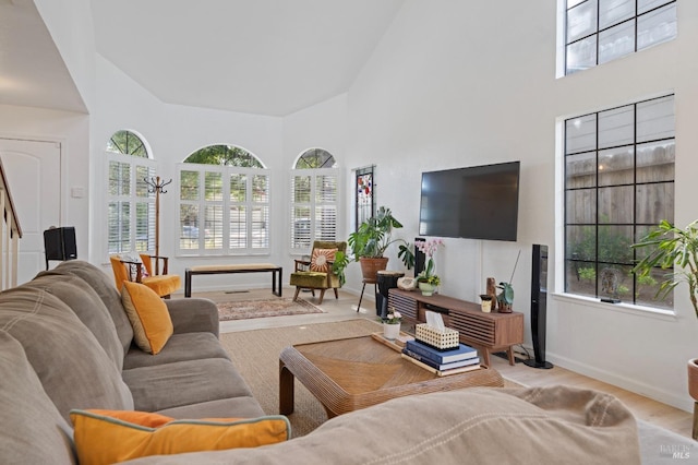 624 N Regatta Dr, Vallejo, CA 94591 - living room with a high ceiling, baseboards, plenty of natural light, and wood finished floors