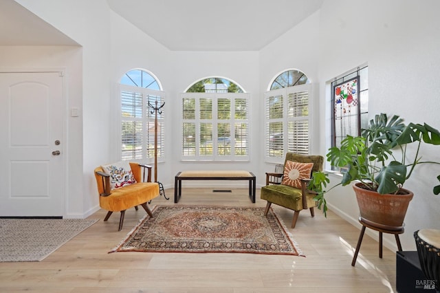 624 N Regatta Dr, Vallejo, CA 94591 - sitting room with wood finished floors, baseboards, and a high ceiling