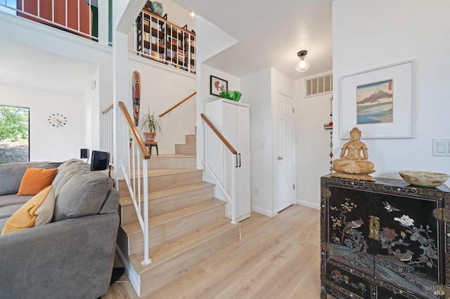 624 N Regatta Dr, Vallejo, CA 94591 - stairway with visible vents, wood finished floors, and baseboards