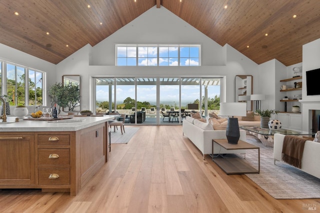 2509 Madrona Ave, Saint Helena, CA 94574 - living room with recessed lighting, light wood finished floors, wood ceiling, high vaulted ceiling, and a fireplace