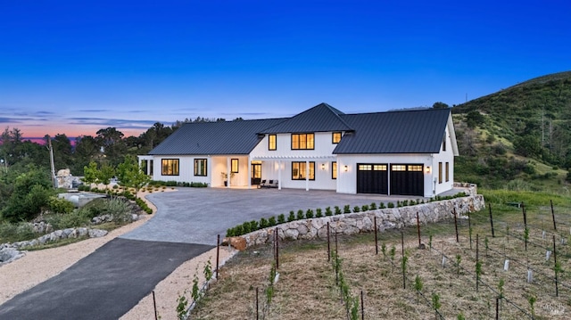2509 Madrona Ave, Saint Helena, CA 94574 - modern farmhouse featuring metal roof, aphalt driveway, an attached garage, and fence