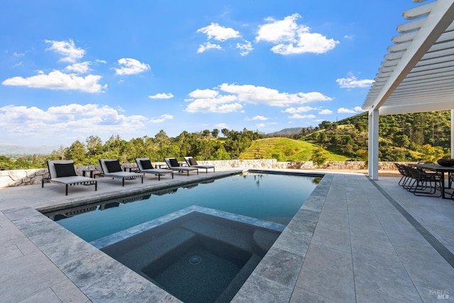 2509 Madrona Ave, Saint Helena, CA 94574 - pool featuring an in ground hot tub, a patio, and a mountain view