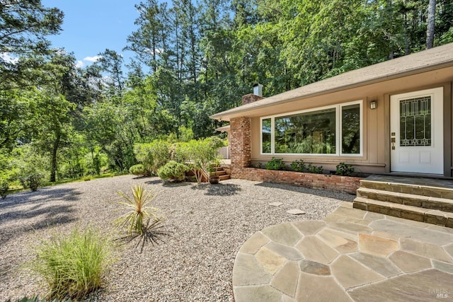 3257 State Highway 128, Calistoga, CA 94515 - property entrance featuring a chimney and board and batten siding