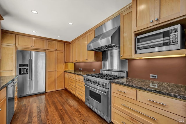 3257 State Highway 128, Calistoga, CA 94515 - kitchen with high quality appliances, wall chimney range hood, dark wood-style floors, dark stone counters, and recessed lighting