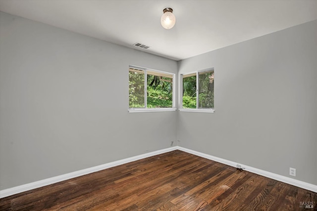 3257 State Highway 128, Calistoga, CA 94515 - spare room featuring baseboards and dark wood-style floors