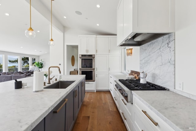46 Lower N Ter, Tiburon, CA 94920 - kitchen with a sink, white cabinets, double oven, a center island with sink, and recessed lighting