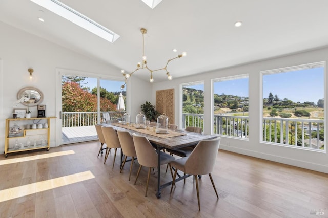 46 Lower N Ter, Tiburon, CA 94920 - dining area with a chandelier, recessed lighting, vaulted ceiling with skylight, and wood finished floors
