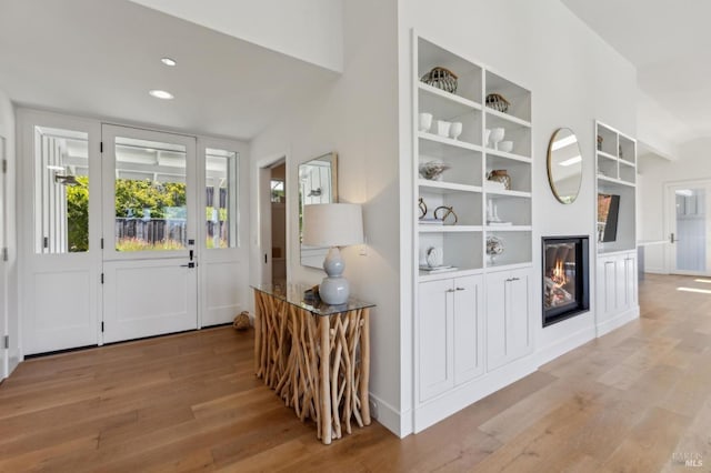 46 Lower N Ter, Tiburon, CA 94920 - living room with light wood-type flooring, a wealth of natural light, recessed lighting, and vaulted ceiling