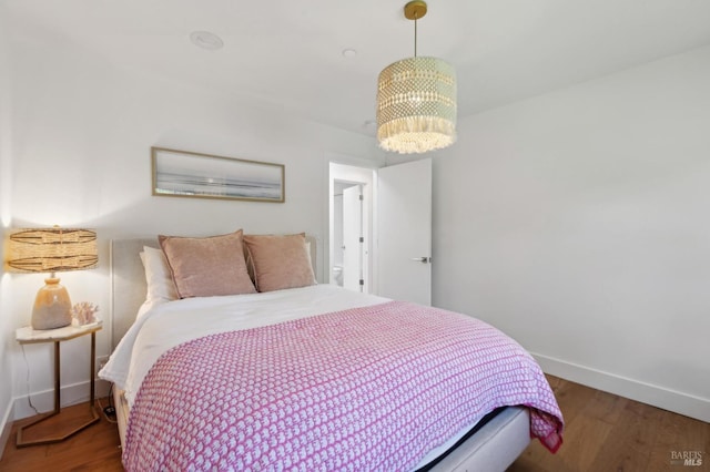 46 Lower N Ter, Tiburon, CA 94920 - bedroom featuring baseboards, a notable chandelier, and wood finished floors