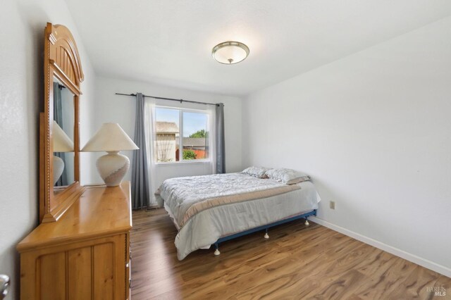 151 Doncaster Dr, Vallejo, CA 94591 - bedroom featuring baseboards and wood finished floors