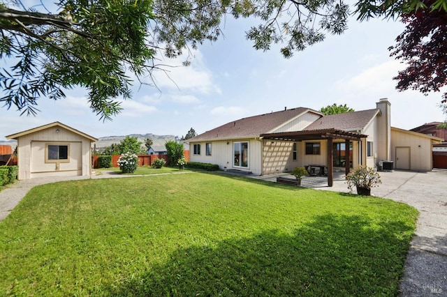 151 Doncaster Dr, Vallejo, CA 94591 - exterior space with a patio area, fence, a front yard, a pergola, and a chimney