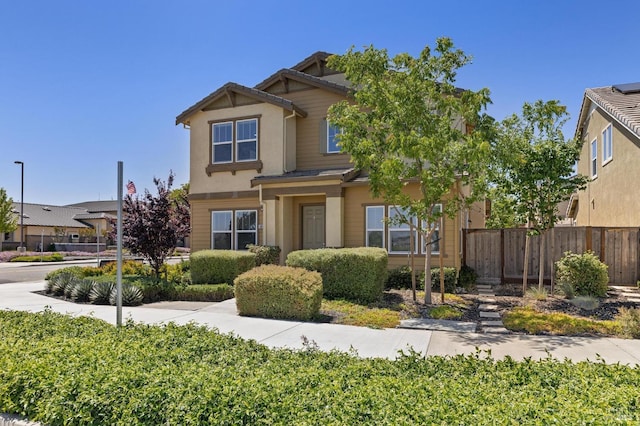 view of front of property with fence