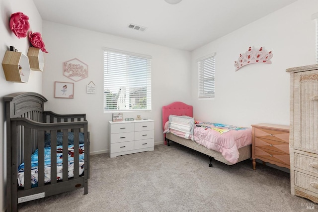 bedroom featuring carpet, baseboards, and visible vents