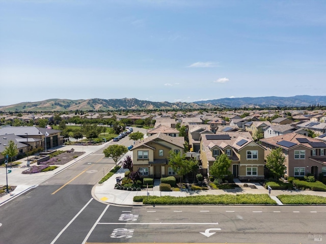 drone / aerial view with a mountain view and a residential view