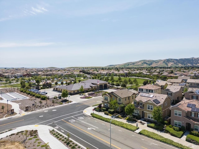 drone / aerial view featuring a mountain view and a residential view
