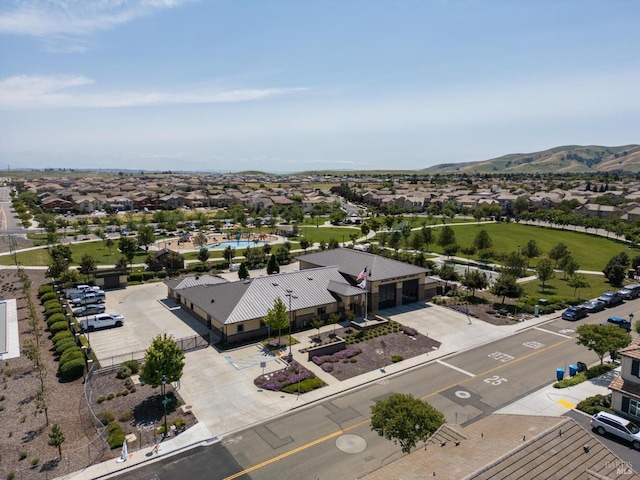 birds eye view of property featuring a mountain view