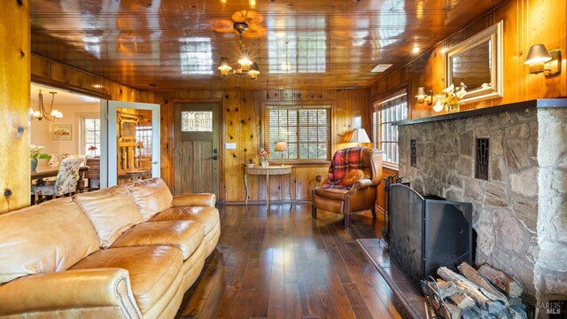 2267 Westside Rd, Healdsburg, CA 95448 - living area with a chandelier, hardwood / wood-style floors, and wood walls