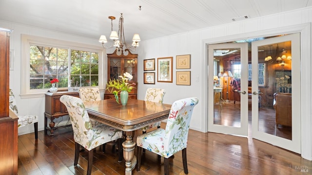 2267 Westside Rd, Healdsburg, CA 95448 - dining area with dark wood-style floors, a chandelier, french doors, and crown molding