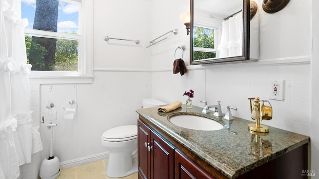 2267 Westside Rd, Healdsburg, CA 95448 - bathroom with tile walls, vanity, and toilet