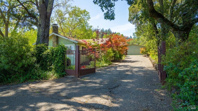 2267 Westside Rd, Healdsburg, CA 95448 - view of property exterior with a chimney and stucco siding