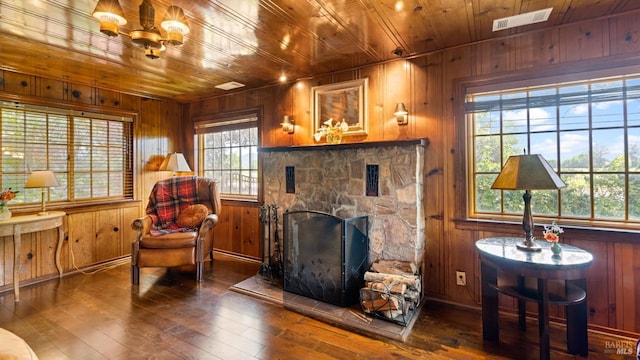 2267 Westside Rd, Healdsburg, CA 95448 - living room with plenty of natural light, hardwood / wood-style flooring, wood walls, a stone fireplace, and wood ceiling