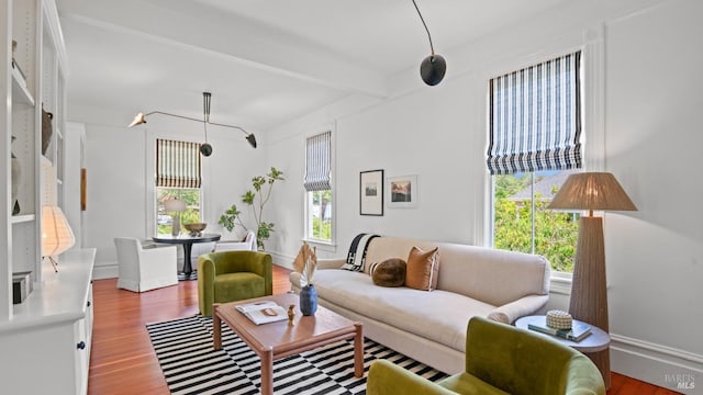 643 3rd St, Napa, CA 94559 - living room with baseboards, beam ceiling, and wood finished floors