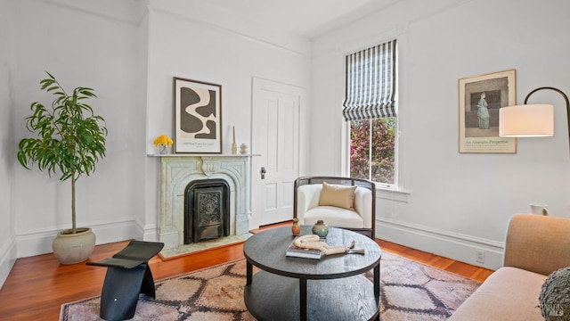 643 3rd St, Napa, CA 94559 - living area with wood finished floors, a fireplace, and baseboards