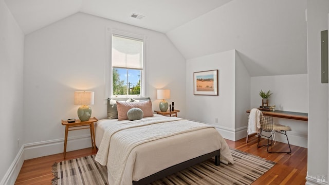 643 3rd St, Napa, CA 94559 - bedroom with lofted ceiling, baseboards, visible vents, and wood finished floors