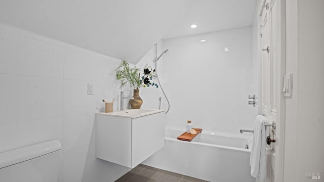 643 3rd St, Napa, CA 94559 - full bathroom with tile walls, toilet, a sink, tile patterned floors, and bathing tub / shower combination