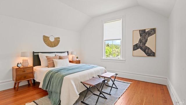 643 3rd St, Napa, CA 94559 - bedroom with lofted ceiling, baseboards, and wood finished floors