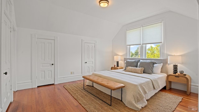 643 3rd St, Napa, CA 94559 - bedroom featuring vaulted ceiling, baseboards, and wood finished floors