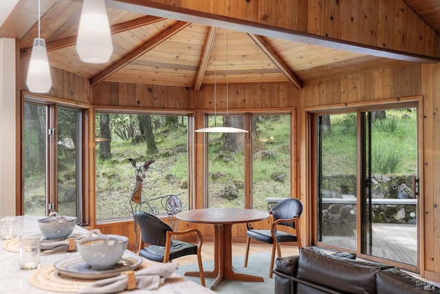 sunroom with beamed ceiling