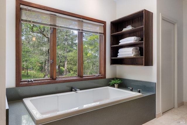 bathroom with a garden tub