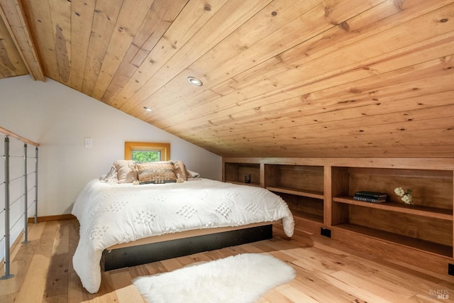 bedroom featuring wood ceiling, baseboards, lofted ceiling with beams, and hardwood / wood-style flooring