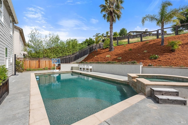 view of pool with an in ground hot tub, a fenced backyard, and a fenced in pool