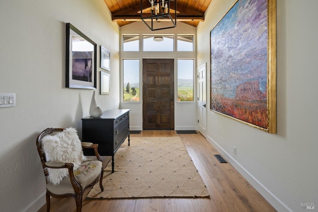 1568 Old Adobe Rd, Petaluma, CA 94954 - entrance foyer with wooden ceiling, light wood-style floors, a chandelier, and baseboards