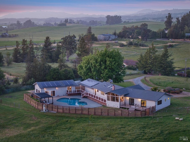 1568 Old Adobe Rd, Petaluma, CA 94954 - aerial view at dusk of a view of countryside, view of pool area, and a mountain view