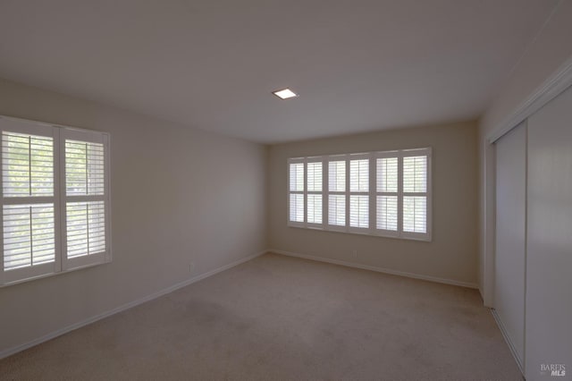 504 C St, San Rafael, CA 94901 - empty room with baseboards, light colored carpet, and plenty of natural light