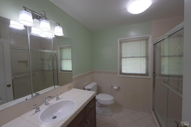 504 C St, San Rafael, CA 94901 - bathroom with a stall shower, vanity, tile walls, and tile patterned floors
