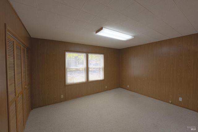 504 C St, San Rafael, CA 94901 - spare room featuring wood walls and carpet floors