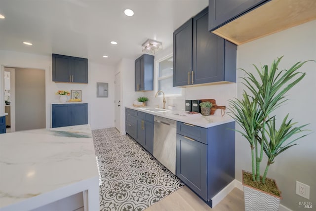 948 Benicia Rd, Vallejo, CA 94591 - kitchen with a sink, stainless steel dishwasher, blue cabinetry, light stone countertops, and recessed lighting