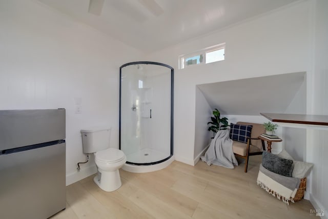 948 Benicia Rd, Vallejo, CA 94591 - full bath with a shower stall, wood finished floors, toilet, and baseboards
