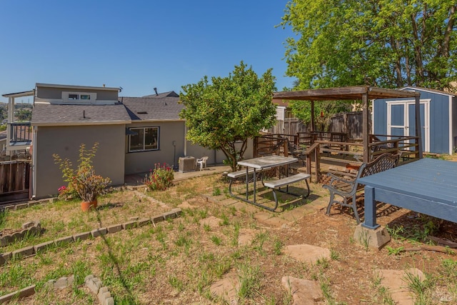 948 Benicia Rd, Vallejo, CA 94591 - view of yard featuring a storage unit, an outbuilding, fence, and central AC unit