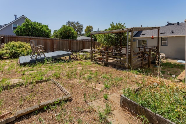 948 Benicia Rd, Vallejo, CA 94591 - fenced backyard with a vegetable garden and a deck
