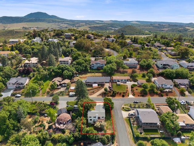 bird's eye view with a residential view and a mountain view