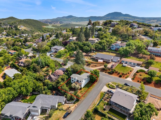 aerial view featuring a mountain view and a residential view