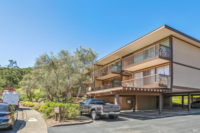 952 Lea Dr, San Rafael, CA 94903 - view of property featuring covered parking