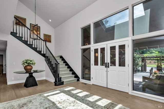 40 Los Pinos, Nicasio, CA 94946 - entrance foyer with stairway, high vaulted ceiling, and wood finished floors