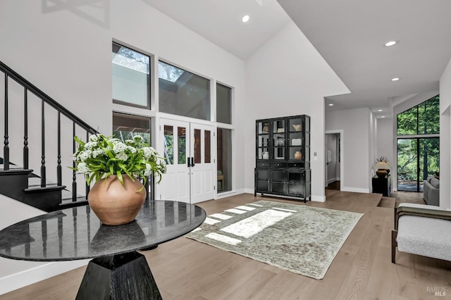 40 Los Pinos, Nicasio, CA 94946 - foyer entrance featuring recessed lighting, baseboards, a towering ceiling, wood finished floors, and stairway